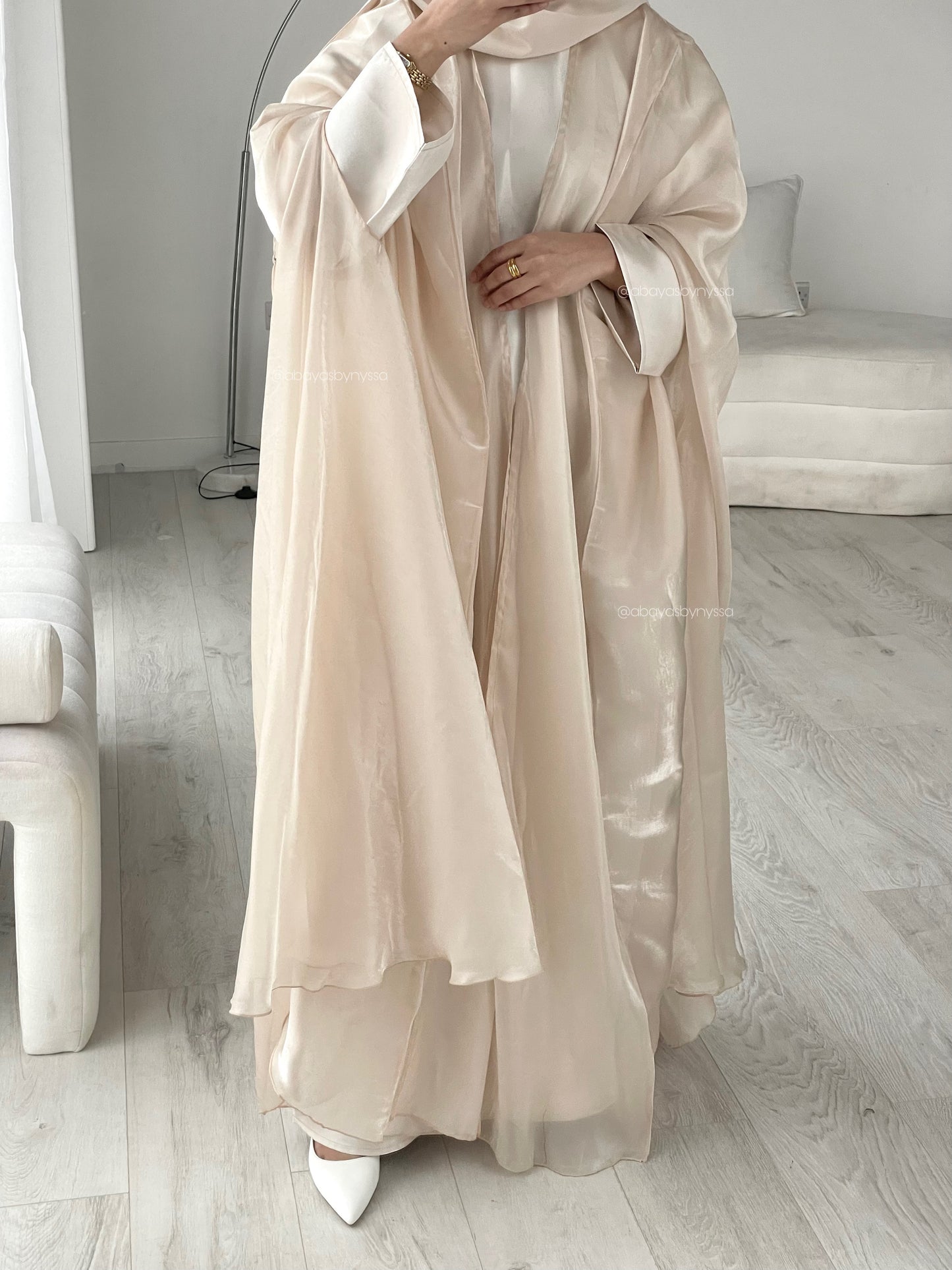 Noor Abaya – Elegant Organza Evening Wear
- ‘Champagne’
