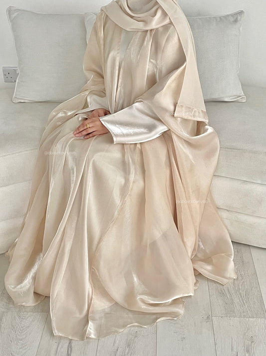 Noor Abaya – Elegant Organza Evening Wear
- ‘Champagne’