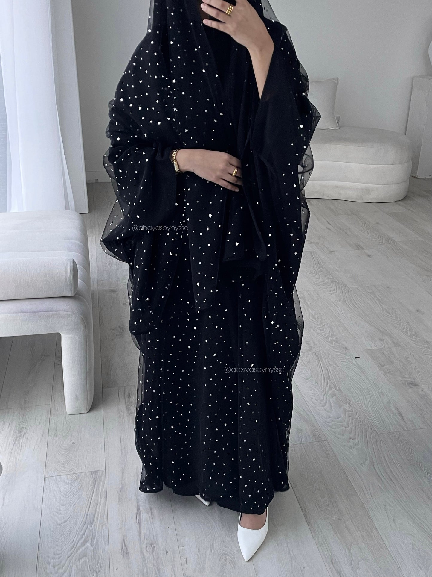 ‘Starry Nights’ Women’s Sparkly Evening Abaya –
- Noir